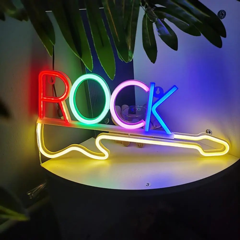 tanda neon diketuai di dinding - gitar rock